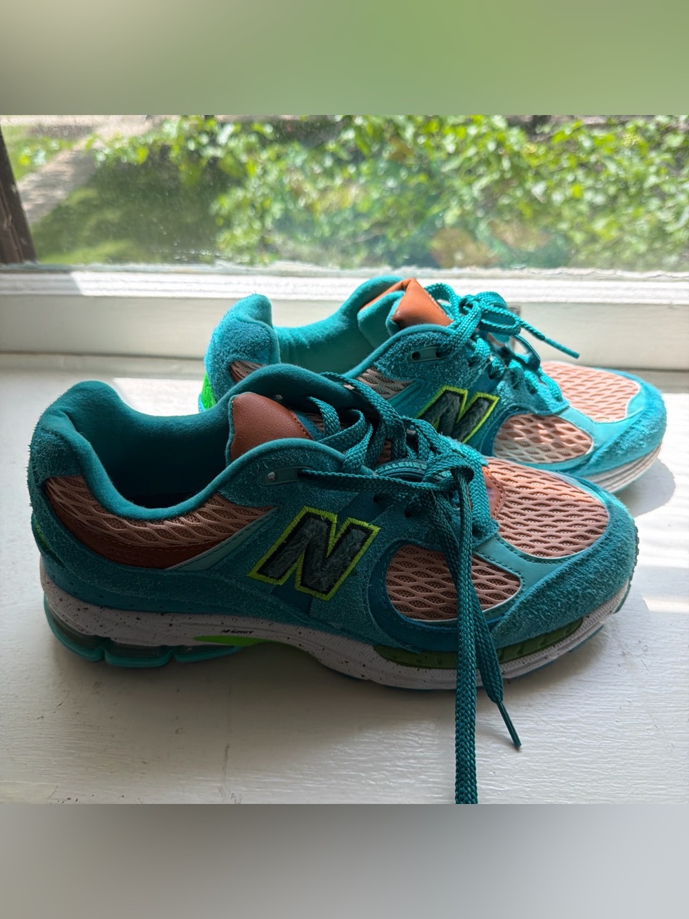 New Balance mens Teal and Peach Athletic Sneakers